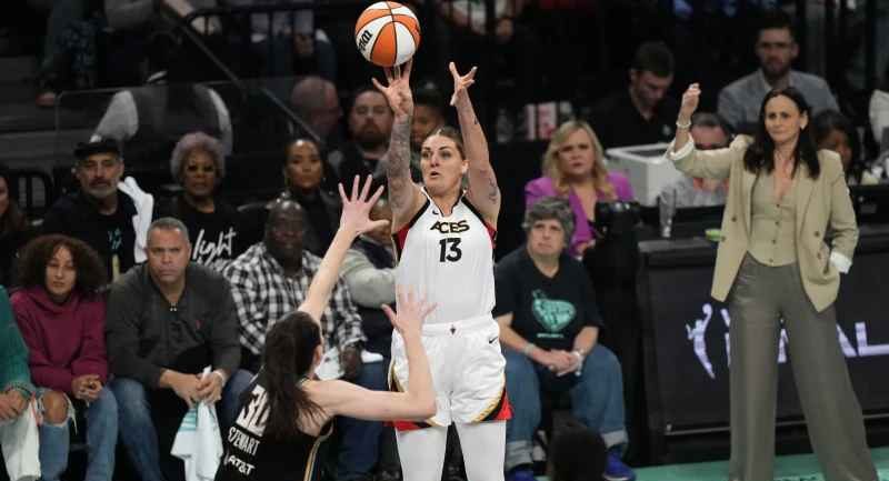 Cayla George (13) of the Las Vegas Aces shoots over New York Liberty's Breanna Stewart (30) during the first half of Game 4 of the WNBA final playoff series on Wednesday, Oct. 18, 2023, in New York. (Photo by Frank Franklin II)