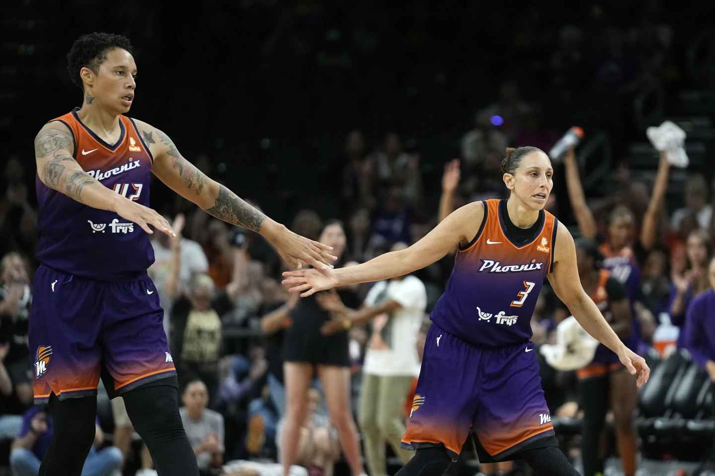On Thursday, May 25, 2023, in Phoenix, Phoenix Mercury center Brittney Griner, left, celebrates a score by guard Diana Taurasi (3) during the second half of the team's WNBA basketball game against the Minnesota Lynx. Diana Taurasi and Brittney Griner lead the USA Basketball Women's National Team roster of 16 players revealed Thursday, Oct. 26, 2023, for a pair of November exhibition games and a training camp in Atlanta. (Photo by Ross D. Franklin)