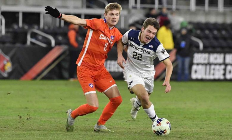 During the second half of the NCAA college soccer tournament championship game in Louisville, Ky., Monday, Dec. 11, 2023, Clemson midfielder Brandon Parrish (11) fights with Notre Dame midfielder Nolan Spicer (22) for the ball. (Google Photo credit)