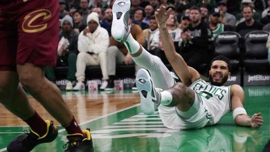 In the first half of an NBA basketball game in Boston on Tuesday, Dec. 12, 2023, forward Jayson Tatum of the Boston Celtics missed a shot on a drive to the basket against the Cleveland Cavaliers. He then hit the floor. (Google Photo Credit)