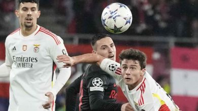 Joao Neves of Benfica (on the right) and Oscar Gloukh of Salzburg (in the middle) fight for the ball during the group D Champions League football match between Salzburg and Benfica at the Red Bull Arena in Salzburg, Austria, on Tuesday, December 12, 2023. (Photo by Matthias Schrader)